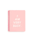 This Rough Draft Notebook comes in pink, with 'I Am Very Busy' printed in white letters across the front.