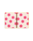 inside cream and pink floral page in mini notebook