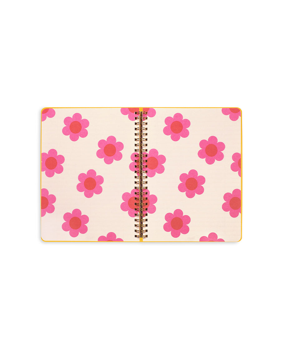 inside cream and pink floral page in mini notebook