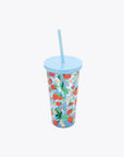 overhead view of reusable tumbler with straw in blue strawberry floral pattern