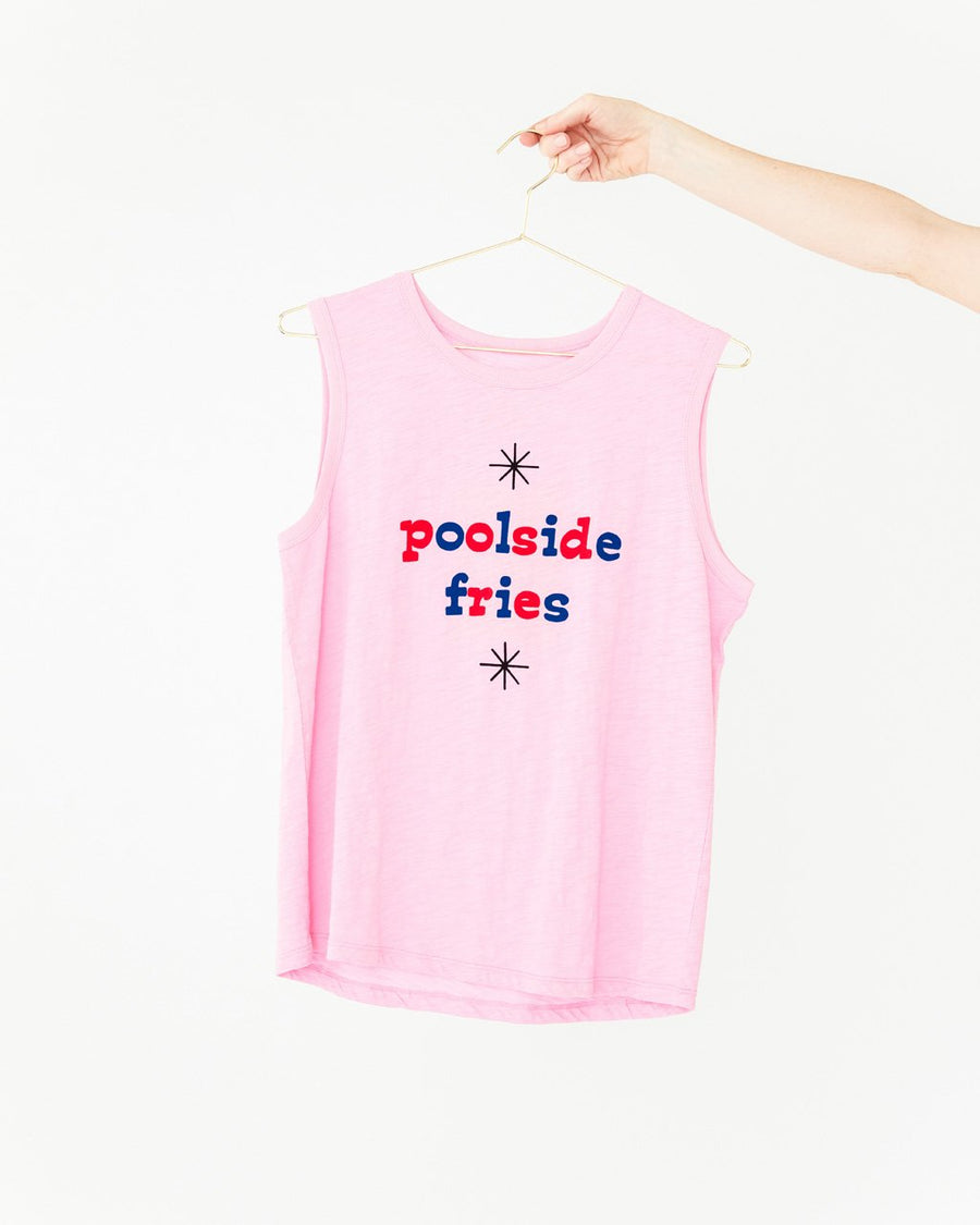 pink muscle tank with the words poolside fries in red and blue lettering shown on hanger