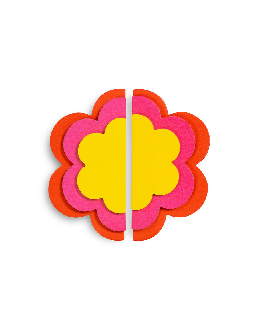 red, pink and yellow stacked sticky notes in a flower design