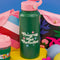 editorial image of dark green and pink stainless steel water bottle with 'progress not perfection' across the center and stickers to decorate your bottle