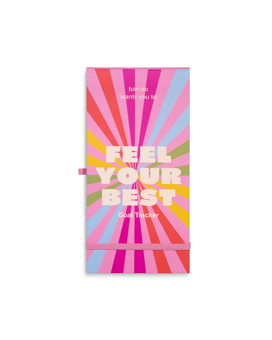 feel your best goal tracker with pink ground and colorful sunburst design