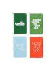 notebooks that say: 'smile', 'create space for yourself', 'you've got this', 'there's only one you'
