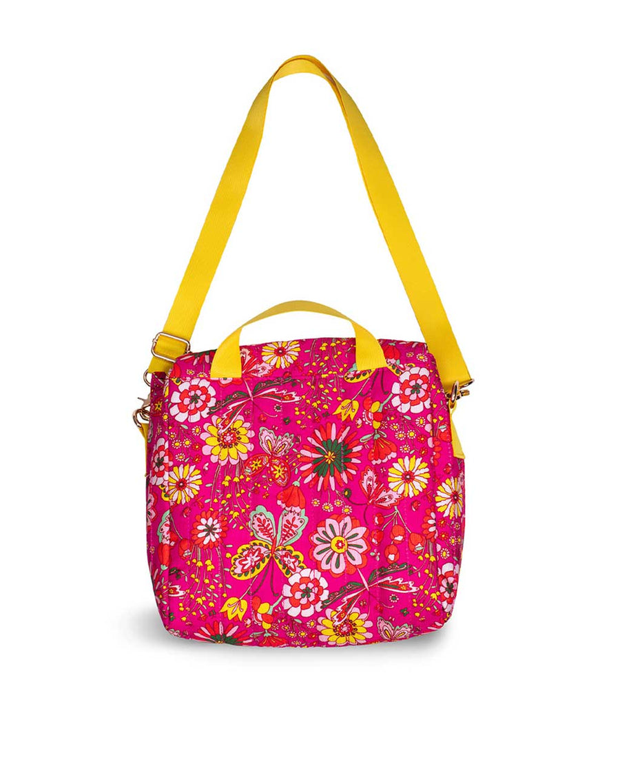 back view of lunch bag with yellow detachable strap, and hot pink garden print