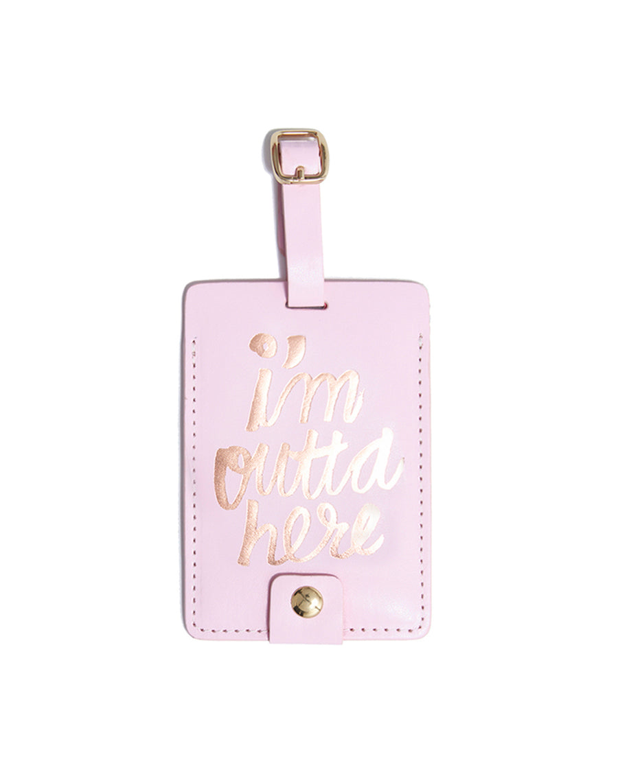 This Getaway Luggage Tag comes in pink, with 'I'm Outta Here' foil-printed in gold on the front.
