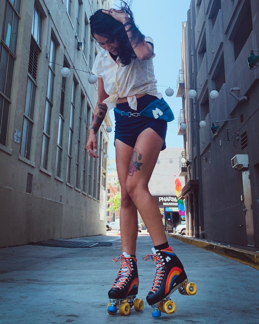 model shown wearing black rainbow skates